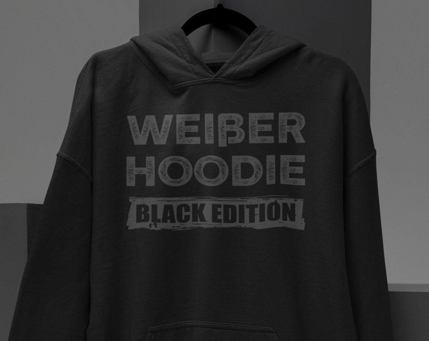 Schwarzer Kaputzenpulli mit dem lustigem Spruch Weißer Hoodie Back Edition